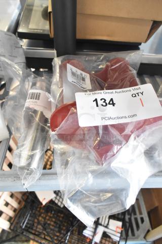 Brand new Robot Coupe 103280S pusher, red plastic, in packaging; labeled as scratch and dent, item 134.