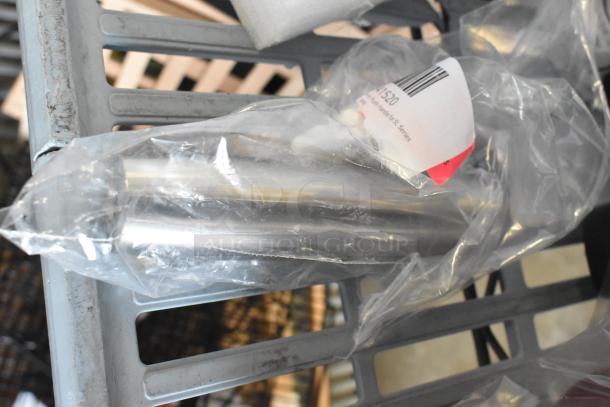 Brand new Robot Coupe 103280S pusher in packaging, labeled as "scratch and dent" on shelf.