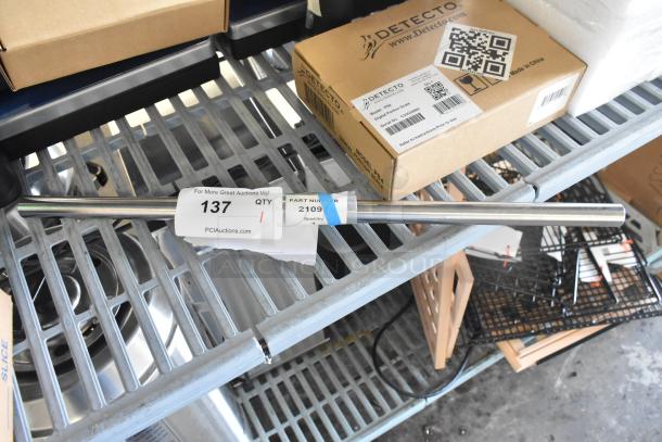 Brand new Blodgett 21097 door handle assembly, stainless steel, labeled part number HP21097, with visible tags.