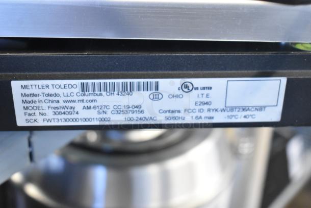 Brand new Mettler Toledo FreshWay AM-6127C digital scale label, shows model, voltage 100-240V, UL listed, tested and working.