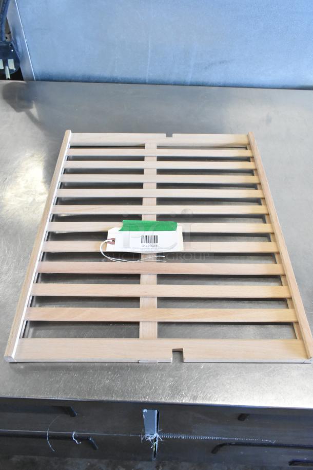 AvaValley wooden rack with slatted design, new, slight cosmetic imperfections. Features tag with item code 34260024.