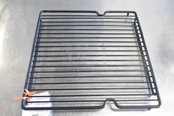 Black metallic AvaValley rack, brand new but labeled scratch and dent. Attached tag visible. Auction for 10 items.