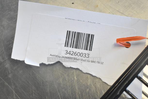 Barcode label reading "34260033 AvaValley 34260033 Small Shelf for BRC-78-SZ" attached to an AvaValley rack.