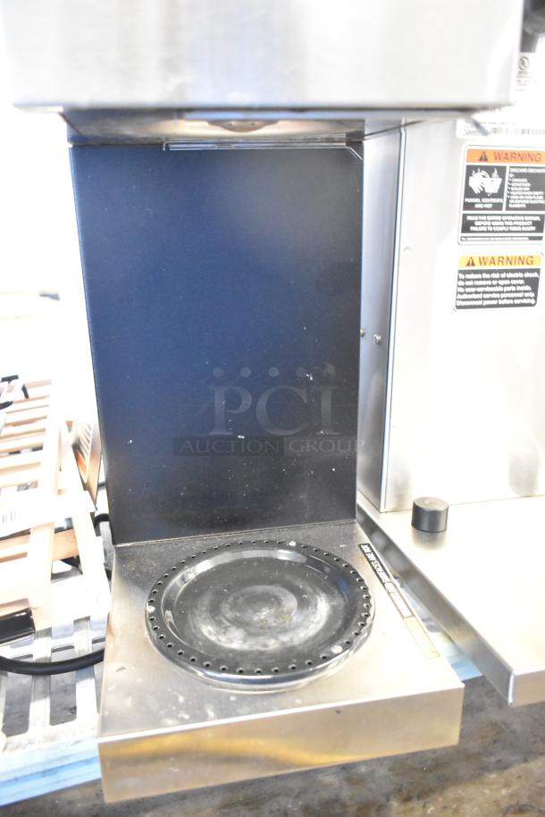 2017 Bunn VPR Black 12 Cup Pourover Coffee Brewer, dual warmers, 120V, visible usage marks, safety label adjacent.