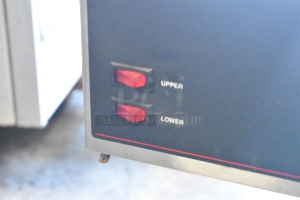 2017 Bunn VPR Black 12 Cup Pourover Coffee Brewer controls, showing upper and lower warmer switches.