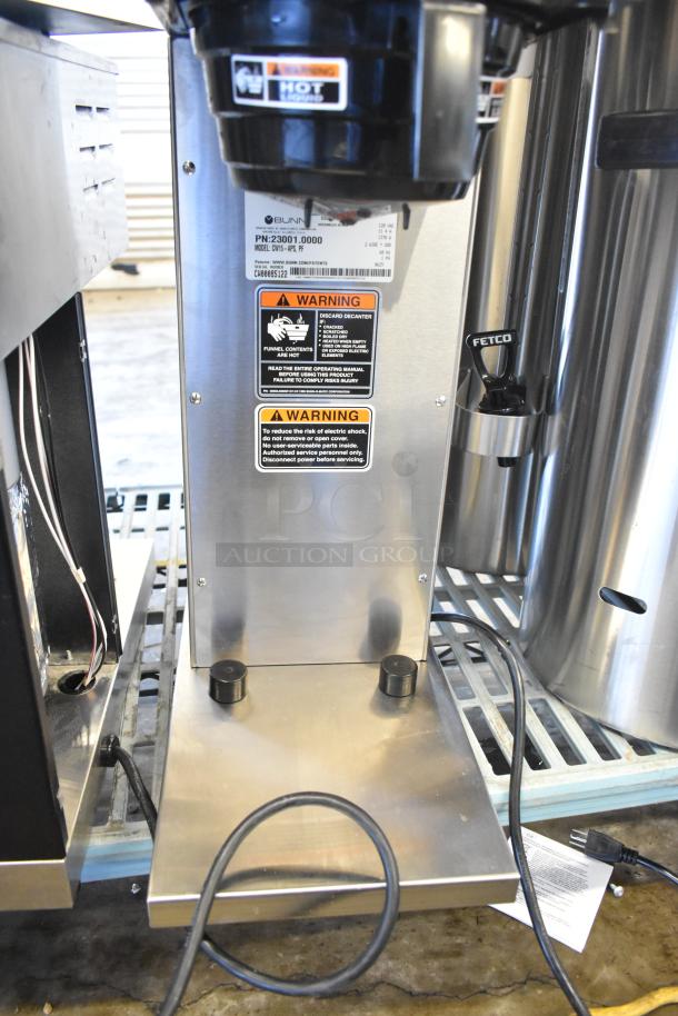 Brand new 2025 Bunn CW15-APS Pourover Airpot Coffee Brewer, model 23001.0000, with scratch and dent. Warning labels visible.