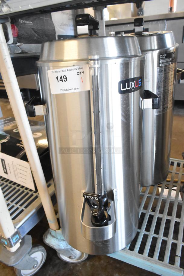Brand new 2024 Fetco TPD-30 Luxus 3-gallon stainless steel coffee dispenser. Scratch and dent, label reads "149."