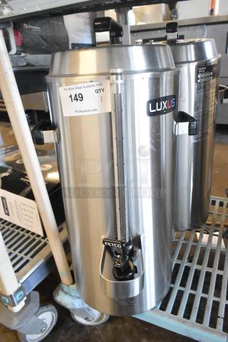 Brand new 2024 Fetco TPD-30 Luxus 3-gallon stainless steel coffee dispenser. Scratch and dent, label reads "149."