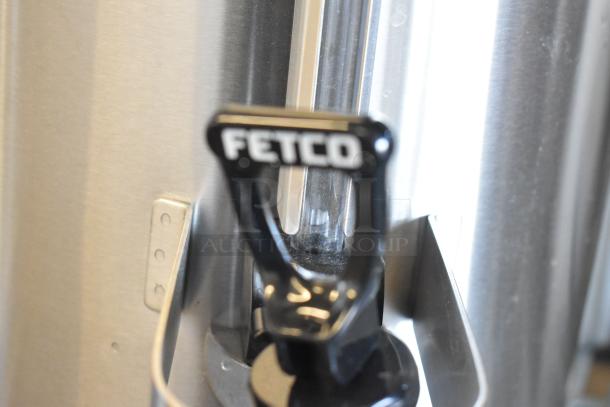 BRAND NEW 2024 Fetco TPD-30 stainless steel coffee dispenser with scratch and dent. Features Fetco tap handle.