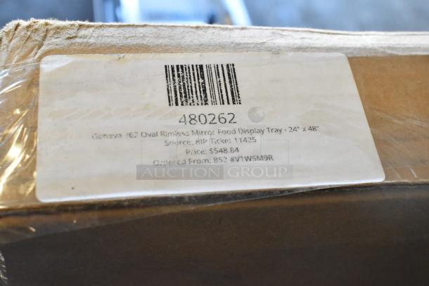 Brand new Geneva 262 Oval Rimless Mirror Food Display Tray, 24"x48". Scratch and dent condition. Visible label with item details.