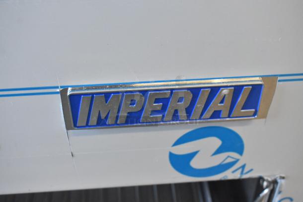 Brand new Imperial IRSB-36 36" natural gas infrared salamander broiler, 40,000 BTU, with visible brand logo.