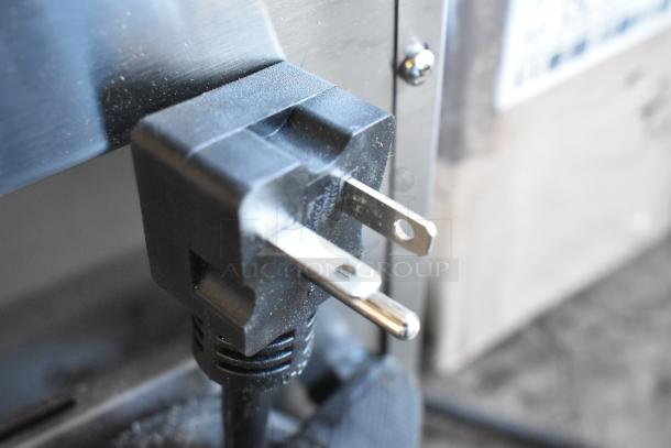 Close-up of power plug of the Avantco 184T3600B conveyor toaster, highlighting its new condition.