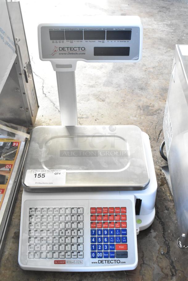 Cardinal Detecto DL1060P 60 lb. digital price computing scale with printer and tower display, used condition, visible keypad.