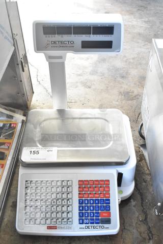 Cardinal Detecto DL1060P 60 lb. digital price computing scale with printer and tower display, used condition, visible keypad.