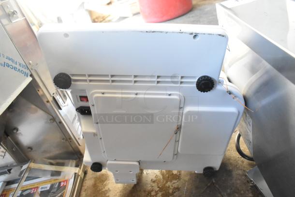 Cardinal Detecto DL1060P digital price computing scale, white, with printer and tower display, good condition.