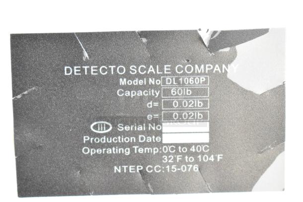Detecto DL1060P scale label showing 60 lb capacity, model details, operating temperature, and NTEP certification.