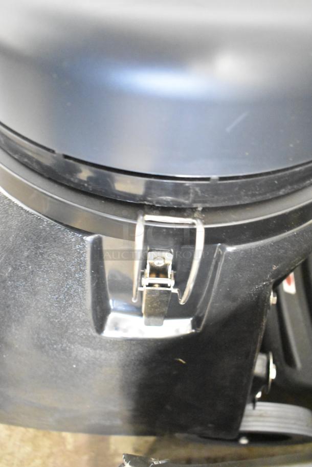 Viper SN18WD Shovelnose Wet/Dry Vacuum, 120V, 1 Phase, shown with a secure metal latch, durable black housing.