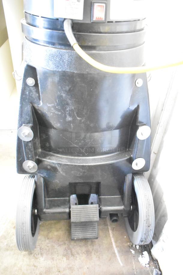 Viper SN18WD Shovelnose Wet/Dry Vacuum, black, 120V, 1 phase. Features sturdy wheels and visible foot pedal.