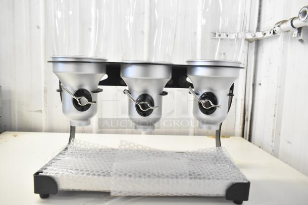 IDM Countertop 3 Well Dry Goods Dispenser, silver finish, clear containers, metal levers, new condition.