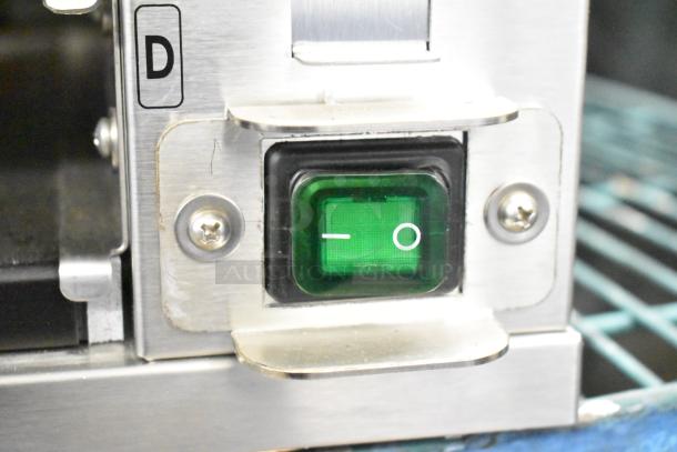 2021 Prince Castle EHB24 Holding Bin with a green power switch. Stainless steel, 208-240V, 1 Phase; label marked "D".