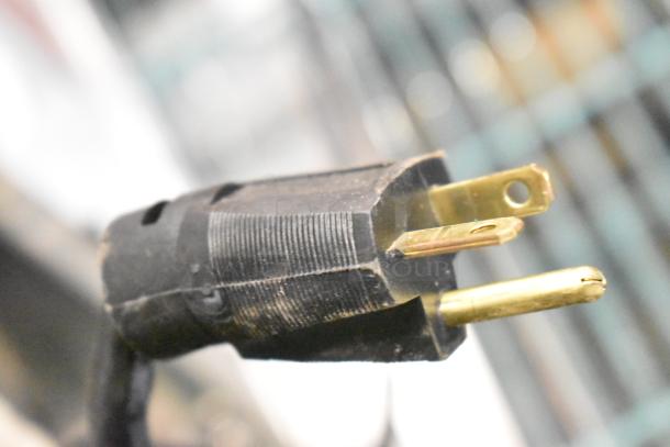 Close-up of a power plug for a Prince Castle EHB24 commercial countertop holding bin, 208-240 volts, 1 phase.