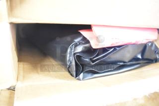 2 new Powerblanket GCW40 gas cylinder heater covers in original packaging, black fabric, for efficient heat distribution.