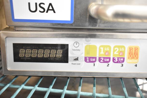 2021 Menumaster OC24BK heavy-duty commercial microwave control panel, showing digital display and cooking settings.