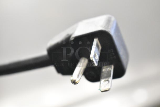 Close-up of a power plug for the Menumaster OC24BK commercial microwave, 208/240 volts, 1 phase.