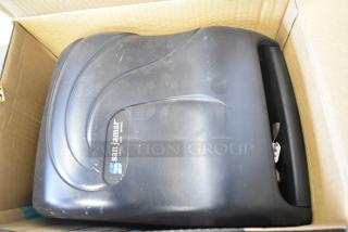 San Jamar T1390TBKB paper towel dispenser, black, gently used, logo visible, in original box.