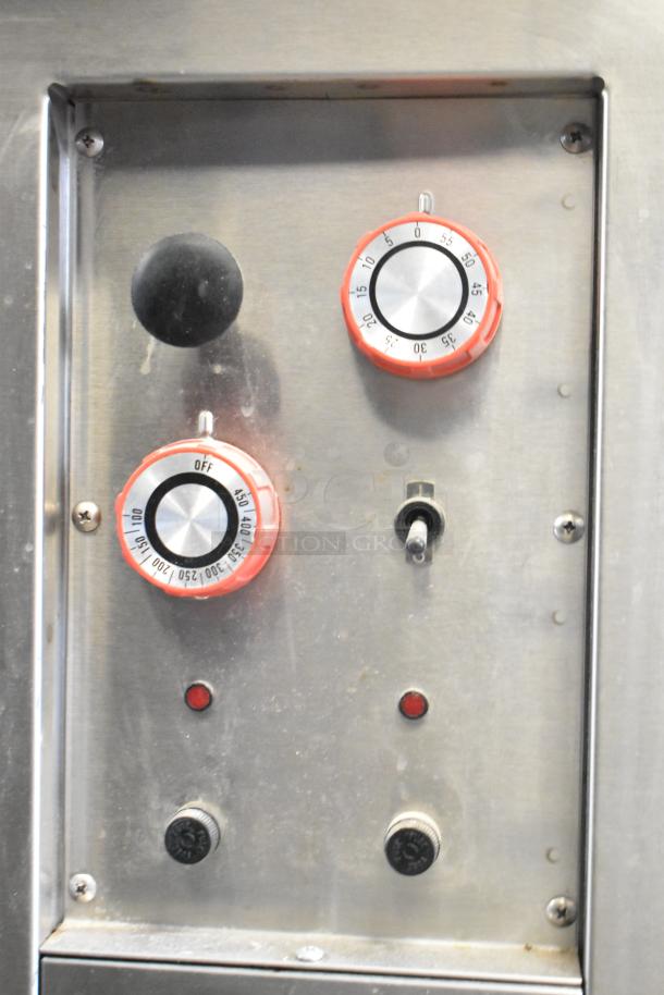 Lang RTI36E induction range controls with dials and switches. Features durable metal panel. 208/240 Volts, 3 Phase.