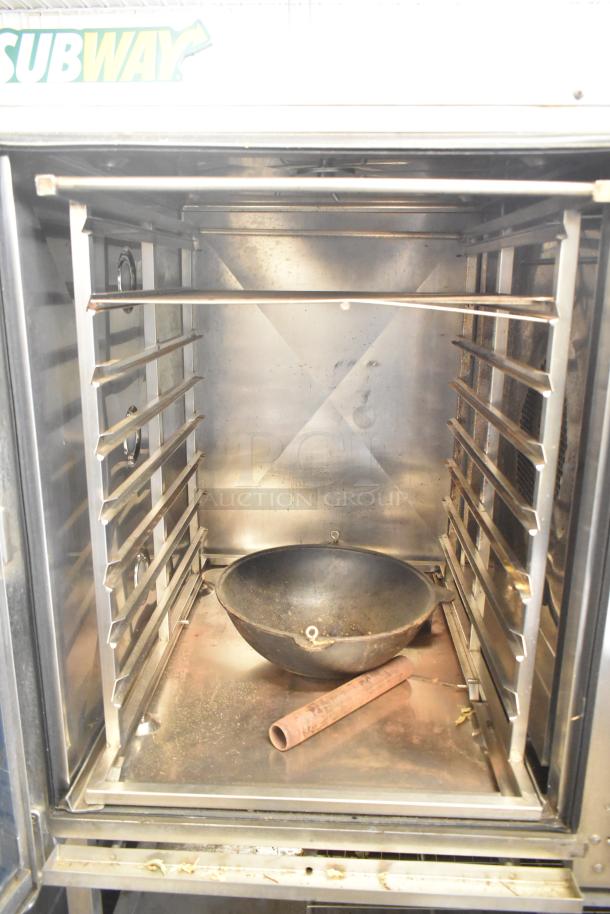 Blodgett 102/BCM2.10 commercial natural gas combi convection oven on casters, interior view, used condition.