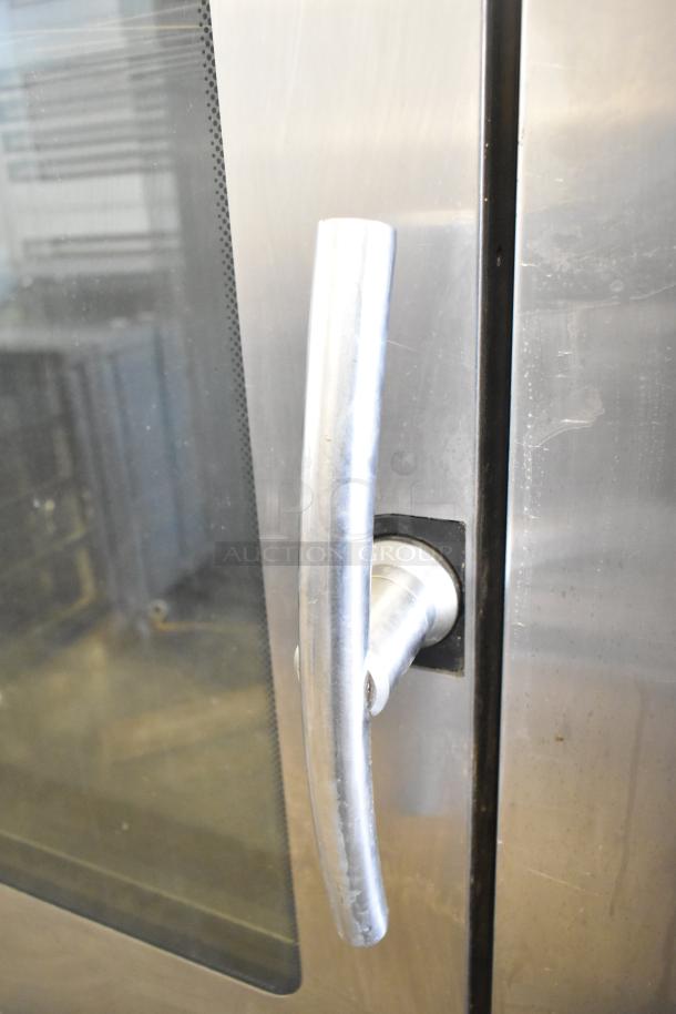 Blodgett 102/BCM2.10 combi convection oven, stainless steel, on commercial casters, natural gas powered.