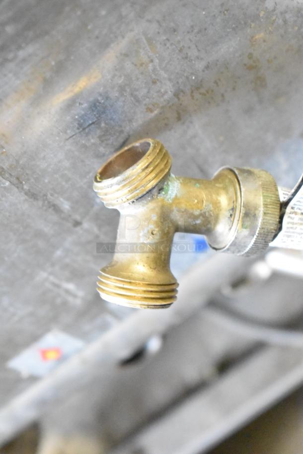 Close-up of a brass fitting on a Blodgett 102/BCM2.10 commercial combi convection oven, showing wear.