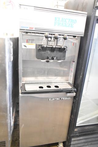 Electro Freeze 88T-RMT-137 soft serve ice cream machine, 2 flavor with twist, water-cooled, on casters, 208-230V, 1 phase.