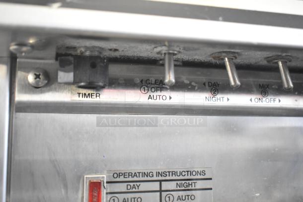 Electro Freeze 88T-RMT-137 control panel with timer knob and operating instructions.