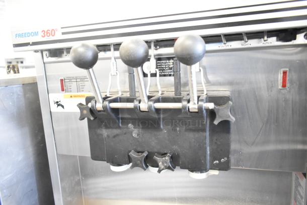 Electro Freeze 88T-RMT-137 soft serve ice cream machine, dual flavor with twist, water-cooled, on casters.