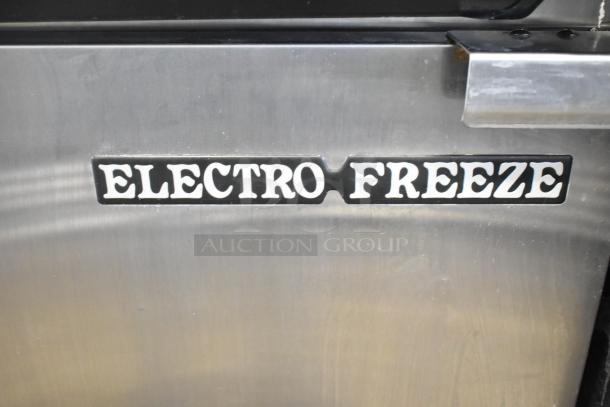 Electro Freeze 88T-RMT-137 soft serve machine, stainless steel, dual flavor with twist, water-cooled, commercial casters.