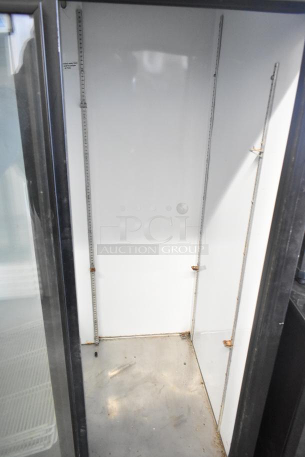 Beverage Air MT38 commercial 2 door cooler, empty interior with shelving tracks, 115 volts, 1 phase, visible wear.