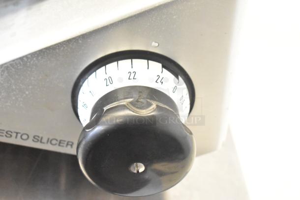 Bizerba commercial countertop meat slicer, 120 volts, 1 phase, features adjustable knob for slicing thickness; durable stainless steel.