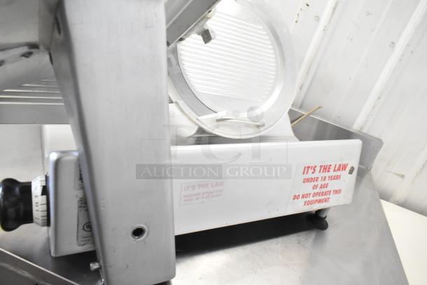 Bizerba commercial countertop meat slicer, 120V, 1 phase; features safety labels and adjustment knob, stainless finish.