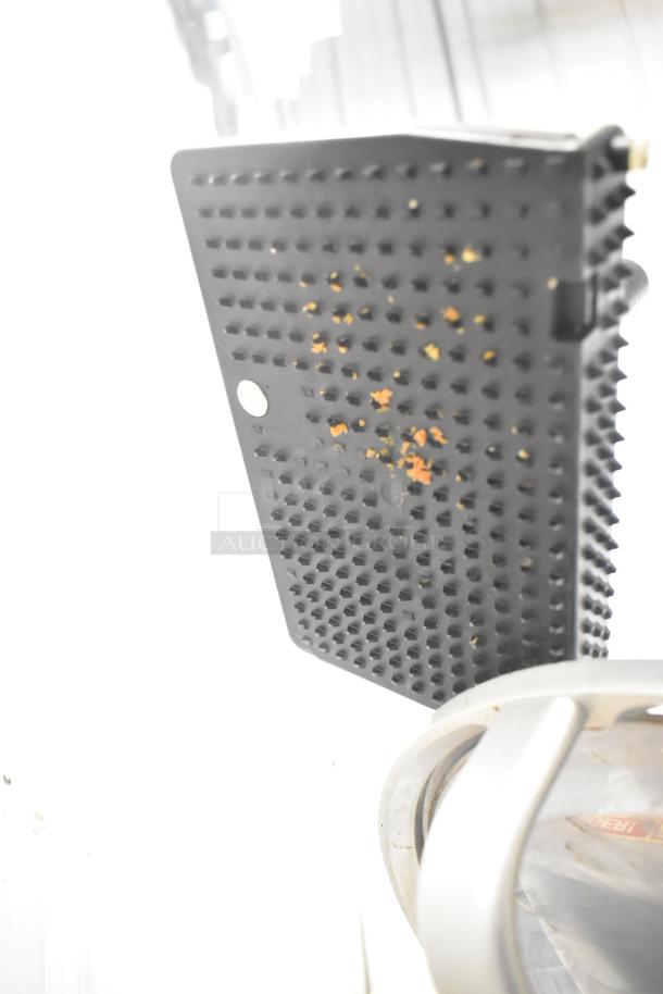 Bizerba commercial countertop meat slicer, 120 volts, 1 phase. Features sturdy metal construction. Some visible wear.