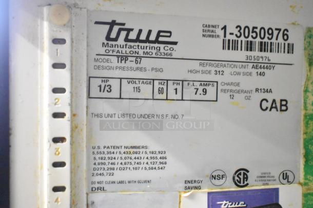 True TPP-67 commercial pizza prep table label, showing model, voltage, and refrigerant details.