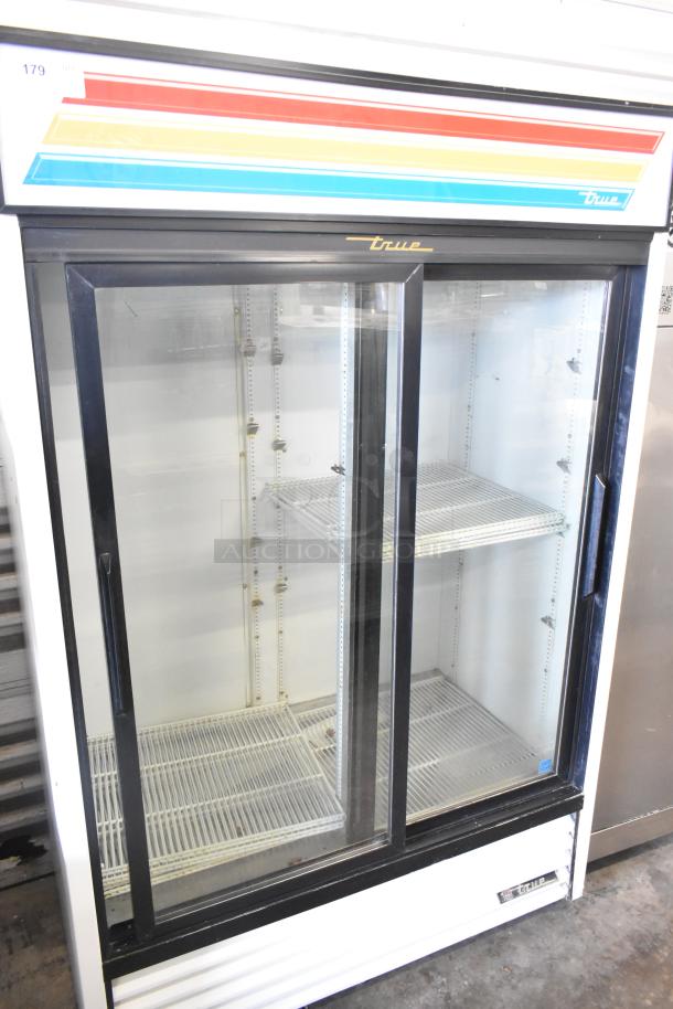 True GDM-45-LD commercial 2-door cooler merchandiser, glass doors, adjustable shelves, 115V, 1 phase, used condition.
