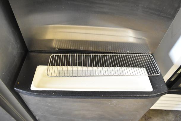 Taylor C712-33 soft serve ice cream machine, water-cooled, 2 flavor with twist, on commercial casters. 208-230V, 3 phase.