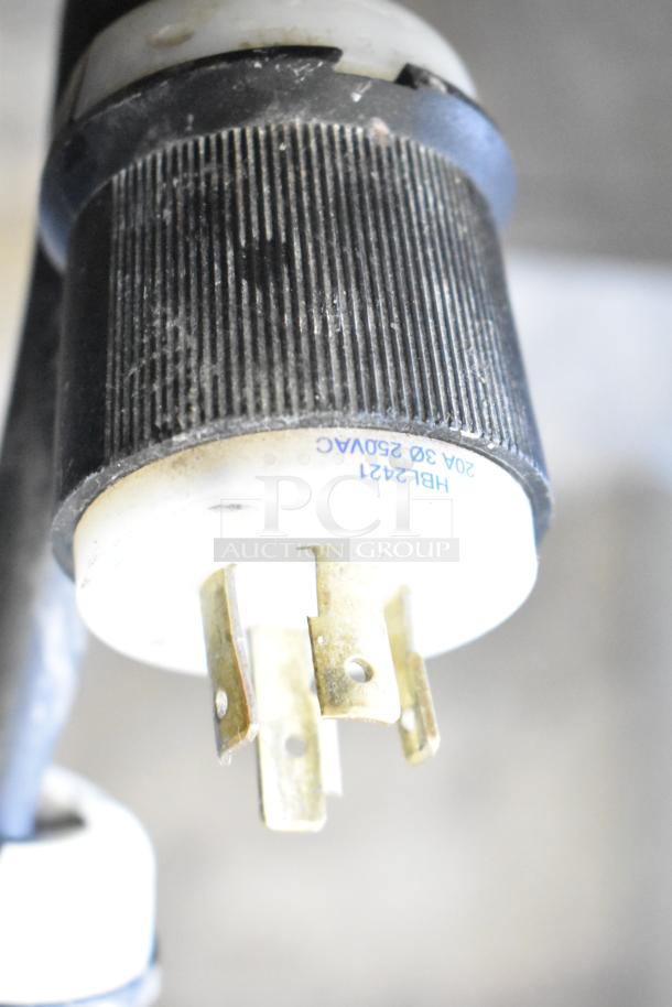 Close-up of a power plug labeled “20A 30 250VAC” suitable for a Taylor C712-33 soft serve ice cream machine.