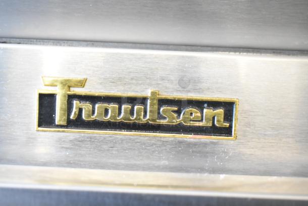 Traulsen G31010 3 door commercial freezer label, gold logo. 115 volts, 1 phase. Stainless steel surface.