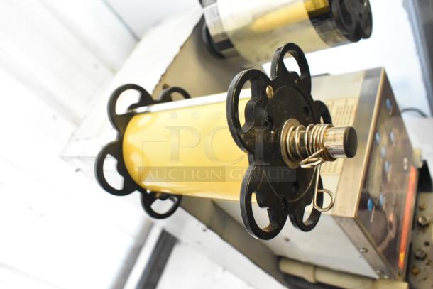 Leadway ET-99SU metal countertop cup sealing machine, 110/120V, showcasing sealing roll holder and control panel details.