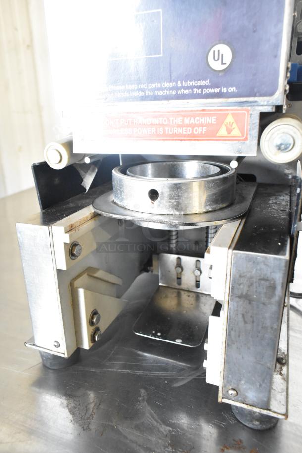 Leadway ET-99SU commercial cup sealing machine, metal construction, 110/120V, 1 phase. UL label visible, sturdy condition.