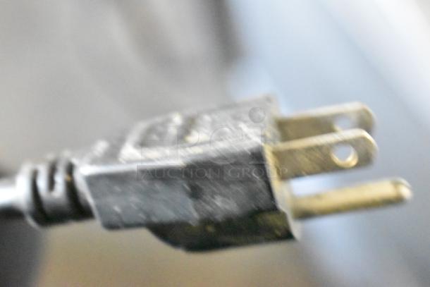 "Leadway ET-99SU cup sealing machine power plug, 110/120V, 1 Phase. Close-up of plug showing standard prongs."