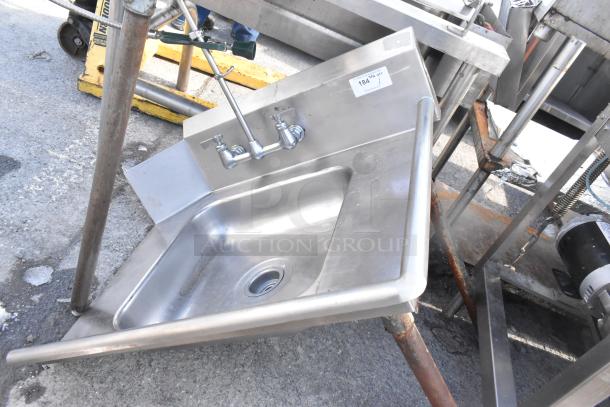 Commercial right-side dirty dish table with integrated stainless steel sink and dual faucet setup. Durable condition.